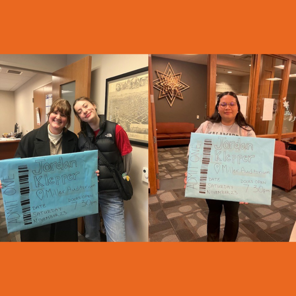 Picture of three students holding giant ticket to Jordan Klepper show.