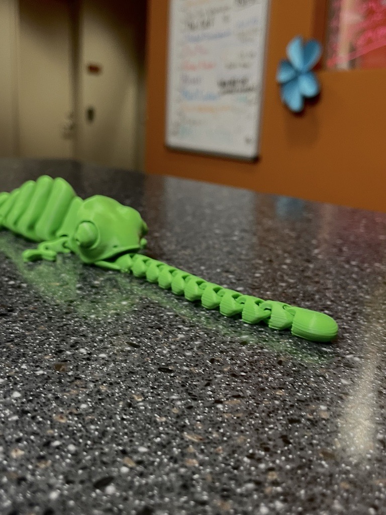 Neon green Chameleon articulated fidget toy